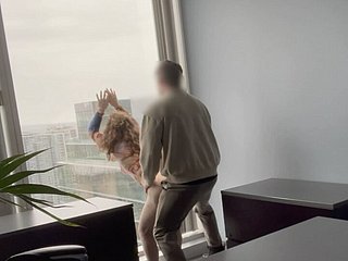 MILF boss fucked against their way office plate glass